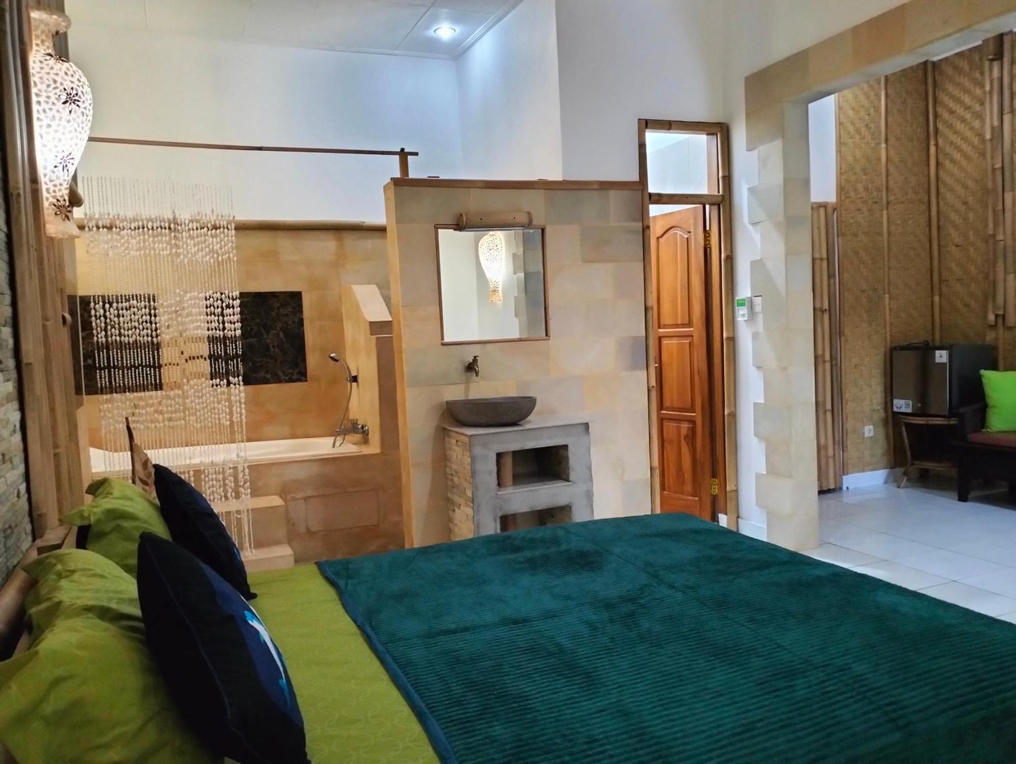 Kaia Lovina Guest House Junior Suite Extérieur photo
