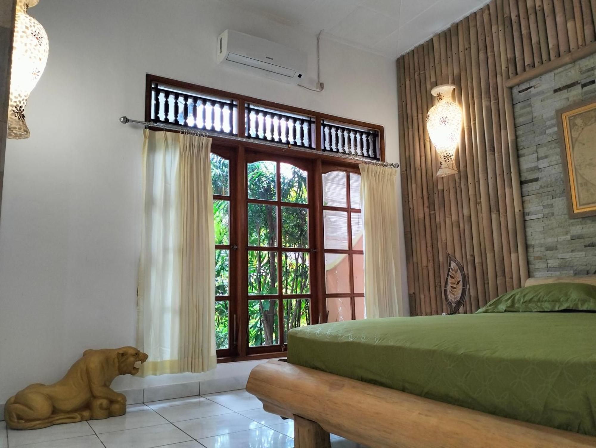 Kaia Lovina Guest House Junior Suite Extérieur photo